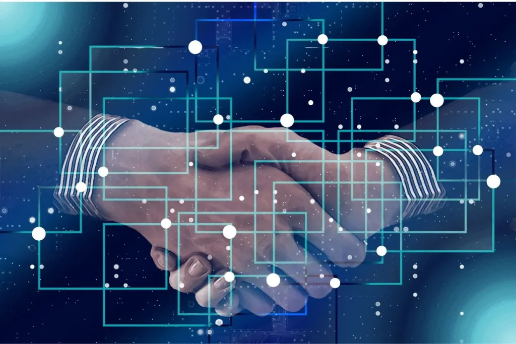 Deux mains qui se serrent avec motifs numériques, image qui illustre la confiance et la transparence offertes par la blockchain.